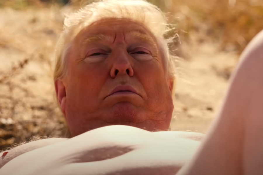 A surreal and digitally altered image depicting a lifelike version of Donald Trump lying shirtless in a desert setting, taken from the Season 27 premiere episode of South Park, titled Sermon on the ‘Mount The scene is part of a satirical deepfake sequence central to the episode’s controversial portrayal of the former president.