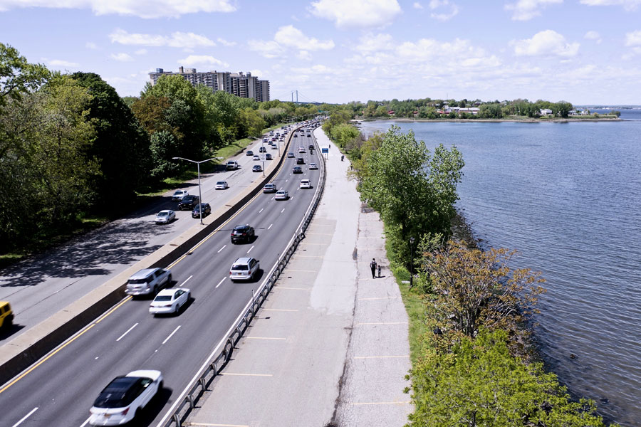 A beautiful, sunny day taking aerial drone shots of the water, boats, and people at The Bayside Marina. With a few images of cars driving by on the Cross Island Parkway, the blue skies and clouds
