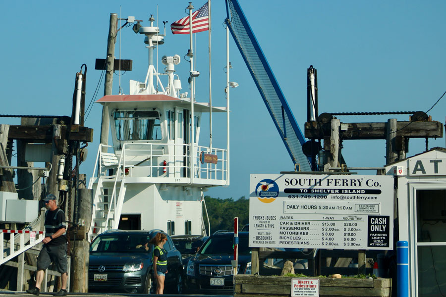 North Haven, NY, USA, 8.6.23 - The ferry terminal and South Ferry heading from Shelter Island.

