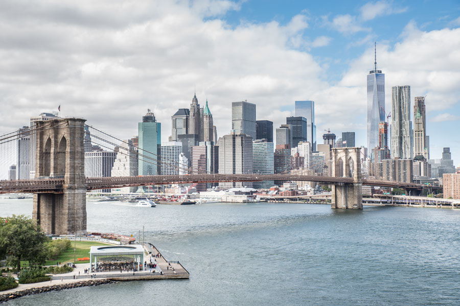 The Brooklyn Bridge with the Manhattan skyline in the background, as seen from the Manhattan Bridge. The iconic span connects Brooklyn and Lower Manhattan, offering one of the most recognizable views of New York City.