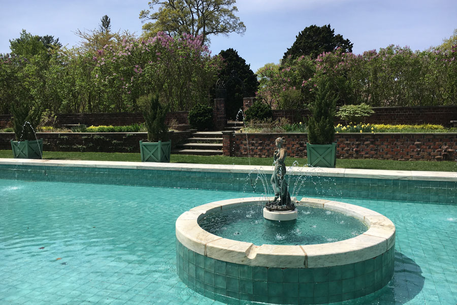 The fountain pool at Planting Fields Arboretum State Historic Park in Upper Brookville, New York. Once part of the Coe Estate, the arboretum is a stunning example of Long Island’s Gold Coast heritage, featuring gardens, greenhouses, and historic architecture that highlight the elegance of the Brookville area.