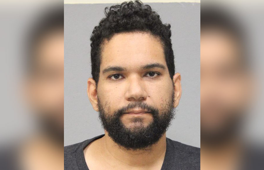 Nassau County Police released this mugshot of Ariel Espinal, 35, of Long Beach, who was arrested in Freeport on September 23, 2025, after allegedly impersonating a police detective with a fake badge and ID.