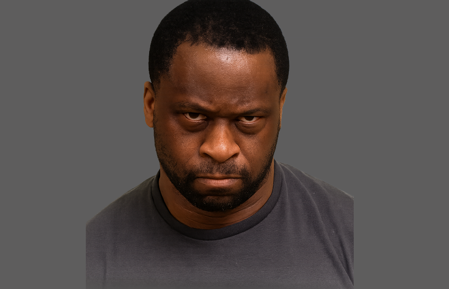 Digitally enhanced and re-rendered mugshot of Gerald Neal, a 50-year-old man from Pennsylvania, originally photographed following his arrest for the murder of Terrance Mitchell, a longtime friend. Neal was indicted by Suffolk County authorities in New York after investigators linked him to Mitchell’s 2019 death. Mitchell’s body was discovered on May 30, 2019, in a wooded area of Wyandanch, Long Island, with multiple gunshot wounds. The arrest and subsequent indictment came years later following a lengthy investigation involving forensic evidence and law enforcement collaboration across state lines.