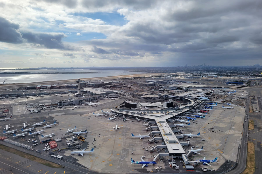 New York City, New York, USA - September 24, 2024: Aerial view of John F. Kennedy International Airport (JFK Airport) on a cloudy afternoon