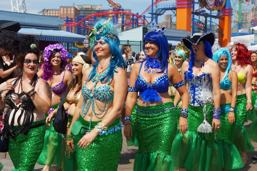 Participants dressed as mermaids take part in the annual Coney Island Mermaid Parade in Brooklyn, New York City, on June 21, 2014. The parade, known as the nation’s largest art parade, celebrates creativity, summer, and the neighborhood’s seaside culture.