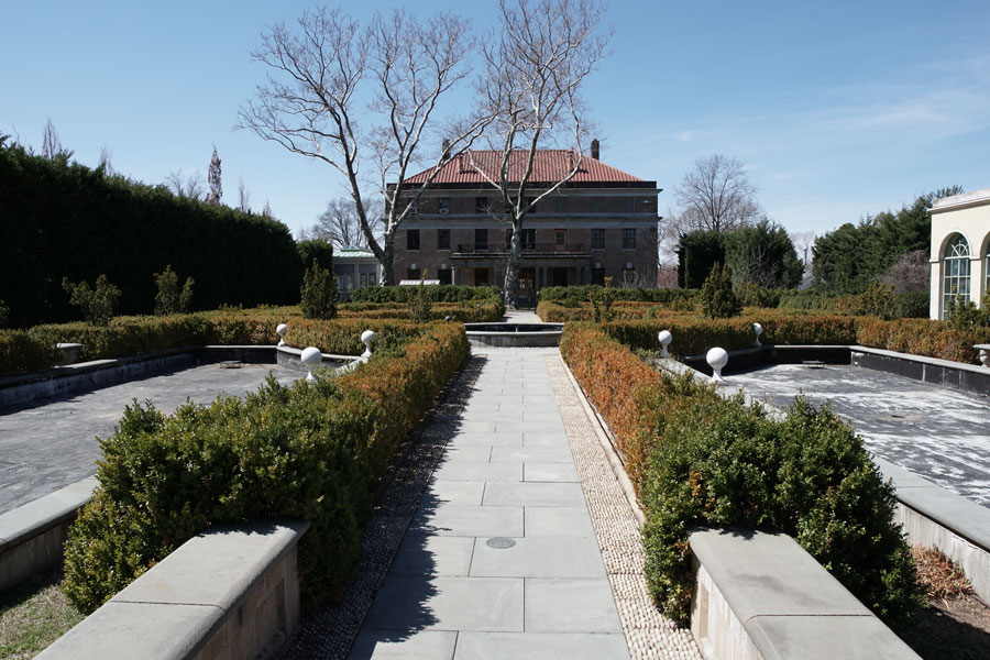 A view of the Tuscan Garden at Snug Harbor Cultural Center and Botanical Gardens, designed in the classical Italian Renaissance style. Featuring symmetrical hedges, stone pathways, and decorative fountains, the garden evokes the elegance of 18th-century European estates. Set within the grounds of Snug Harbor — a former home for retired sailors now transformed into a vibrant cultural and educational destination — the Tuscan Garden offers visitors a serene retreat and one of the most picturesque landscapes on Staten Island.