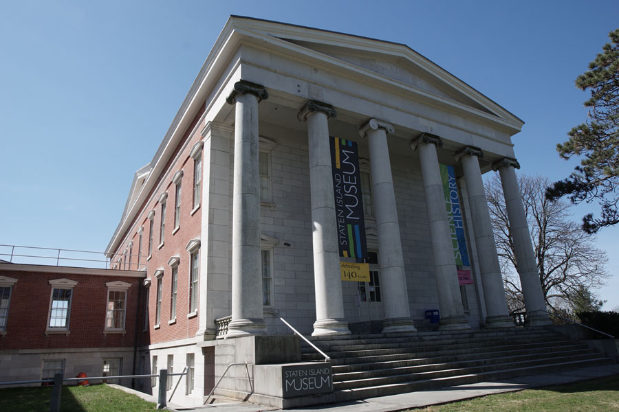 The exterior of the Staten Island Museum, located at the Snug Harbor Cultural Center and Botanical Gardens. Housed in a historic Greek Revival building, the museum is the borough’s oldest cultural institution, founded in 1881. Its diverse collections span art, natural science, and local history, offering visitors a rich perspective on Staten Island’s heritage and its role within New York City.