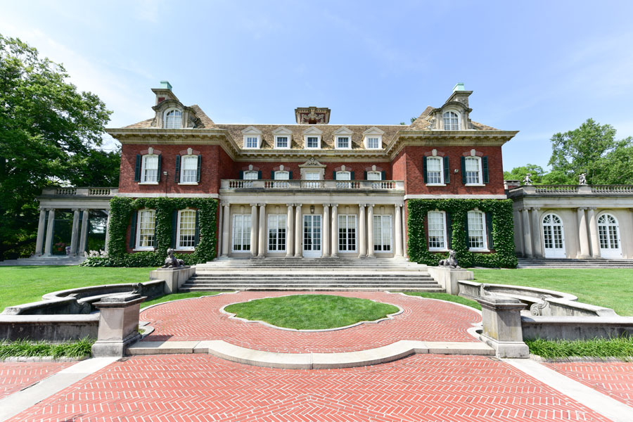 This grand mansion at Old Westbury Gardens in Old Westbury, New York, is one of the most celebrated Gold Coast estates on Long Island. Built in 1906 for John S. Phipps and designed in the Charles II English Revival style, the mansion is surrounded by exquisitely landscaped gardens and formal terraces. Today, Old Westbury Gardens is open to the public, offering guided tours, seasonal events, and the chance to experience the opulence and beauty of Long Island’s Gilded Age firsthand.