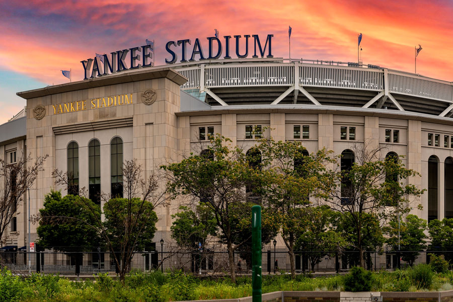 Yankee Stadium, one of the most iconic sports venues in the United States, located in the Bronx. With a seating capacity of over 46,000, it serves as the home field for the legendary New York Yankees, the most successful franchise in Major League Baseball history. Beyond baseball, Yankee Stadium also hosts concerts, soccer matches, and other major events, making it a year-round centerpiece for sports and entertainment in New York City.