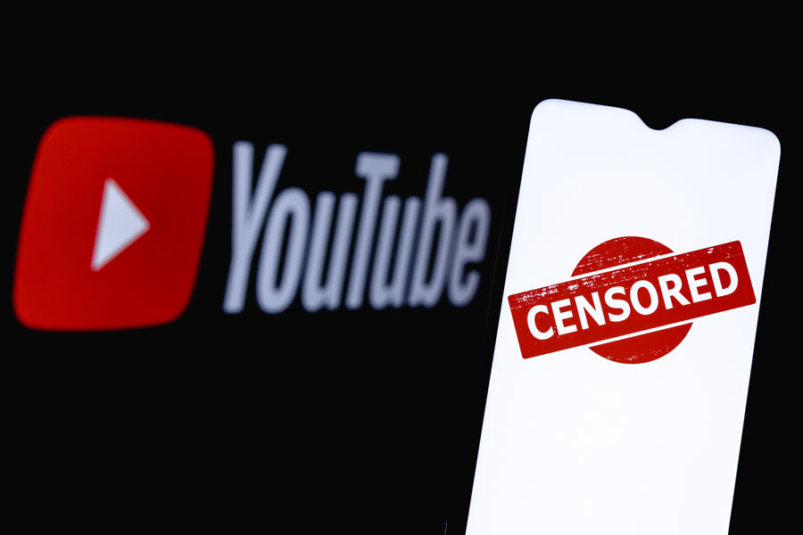 
A smartphone screen displaying a “Censored” message in front of the YouTube logo. Google’s video platform is moving to reinstate accounts banned under its former COVID-19 and election misinformation rules. File photo: Sergei Elagin, licensed.