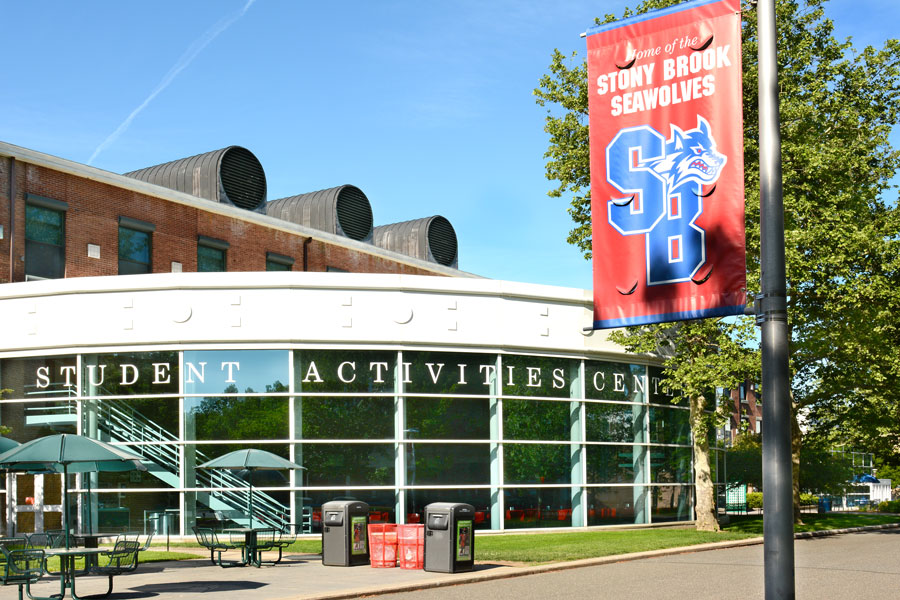 The Student Activities Center (SAC) at Stony Brook University in Stony Brook, NY, with a visible banner for the Stony Brook Seawolves, the university’s athletic teams. Stony Brook University is recognized as a top-ranked academic institution located on Long Island, New York, known for its research programs, diverse student life, and competitive athletics.