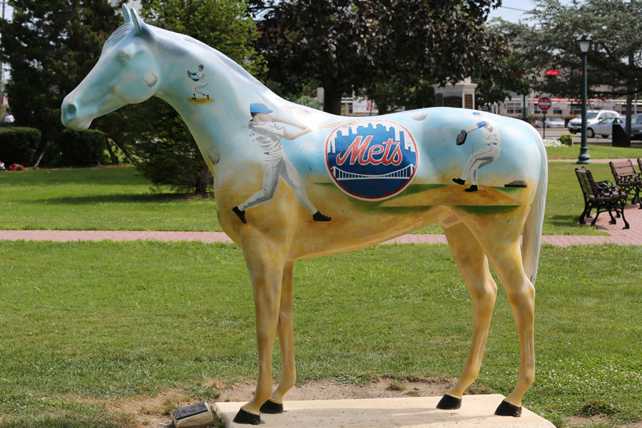 A sculpted horse painted with a New York Mets theme sits on display in Cedarhurst as part of the community’s public art scene. This piece aligns with Cedarhurst’s rich tradition of outdoor sculpture — the village is home to the Goldman-Kuenz Sculpture Park, which includes “Kimball the Horse,” a sculpture made from repurposed car bumpers