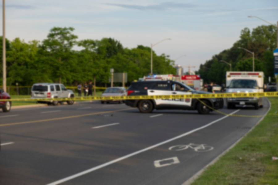 Crash scene with police tape.