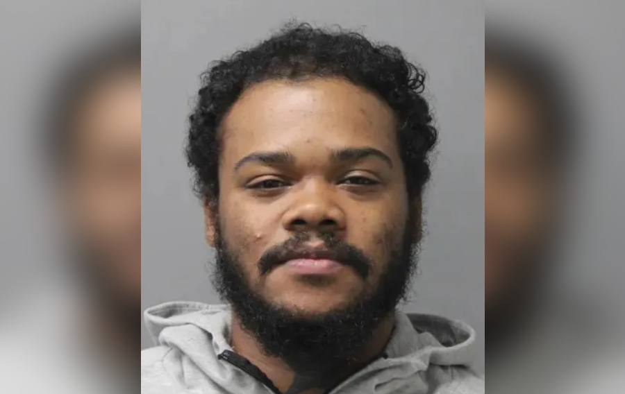 Mugshot of Jawarren Booker, a 29-year-old man from Ridge, New York, who authorities say forced his way into a senior woman’s Holbrook apartment and violently assaulted her before fleeing the scene.