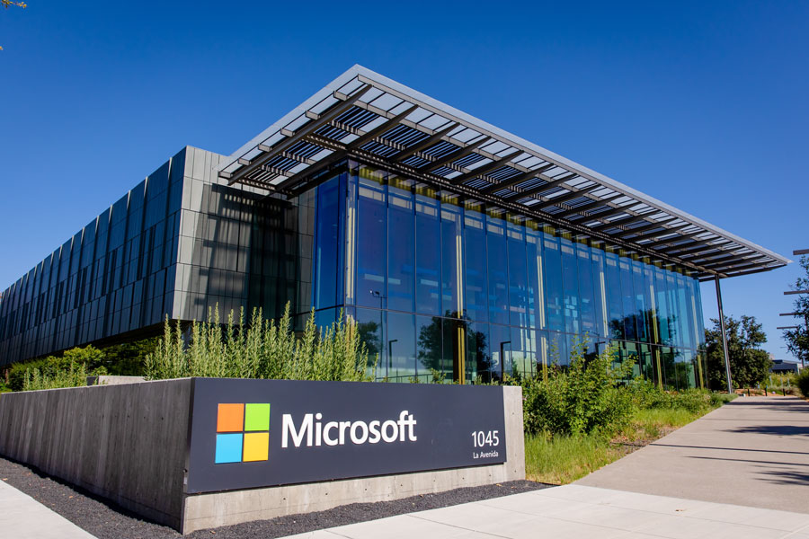 Modern Microsoft office building in Silicon Valley, shown amid rising legal scrutiny over the company’s partnership with OpenAI and the alleged use of copyrighted news content to train AI models.