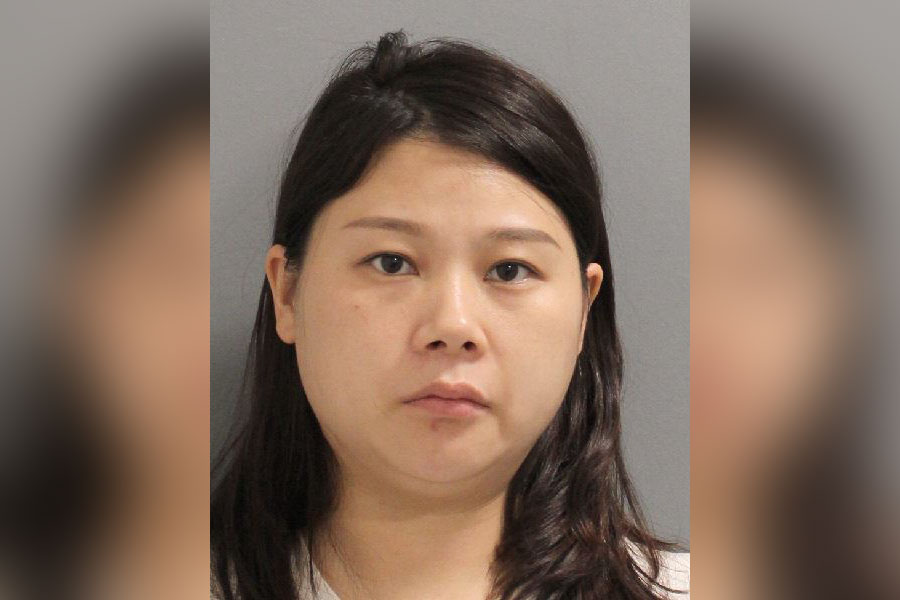 Mugshot of Ji Chen, a 30-year-old woman from Flushing, Queens, charged with unauthorized practice of a profession following a police investigation at a North Bellmore spa.