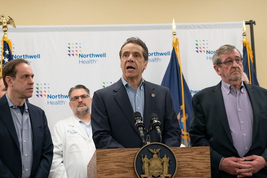 Press conference at a Northwell Health facility in North New Hyde Park, NY with state officials and medical staff discussing COVID-19 response in 2020.