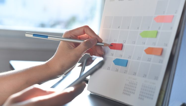 Calendar showing recurring annual dates and planning markers, representing seasonal and civic timing patterns on Long Island