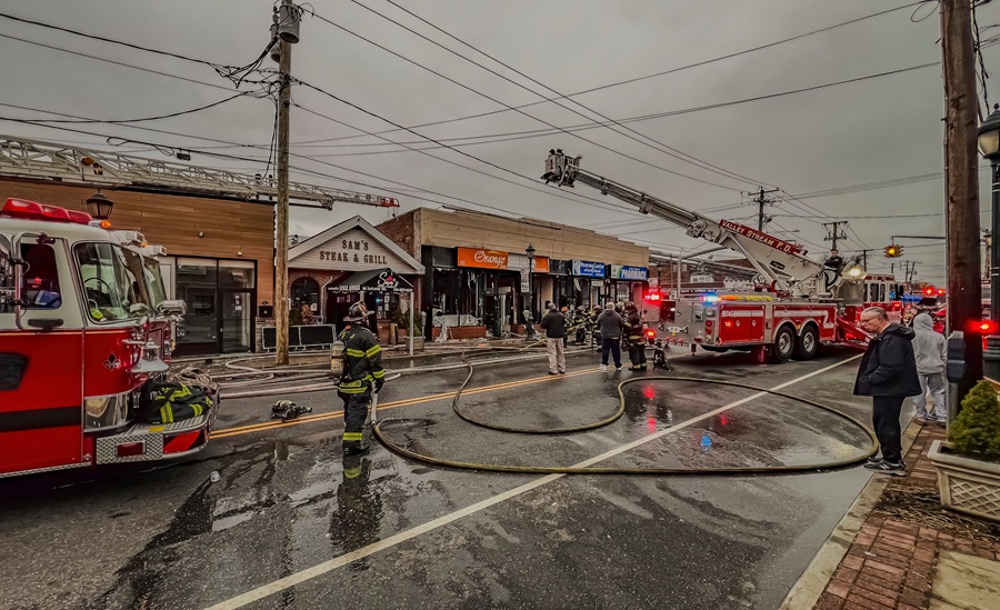 Multiple Long Island fire departments responding to a multi-alarm fire, illustrating coordination between independent fire districts rather than town or village agencies