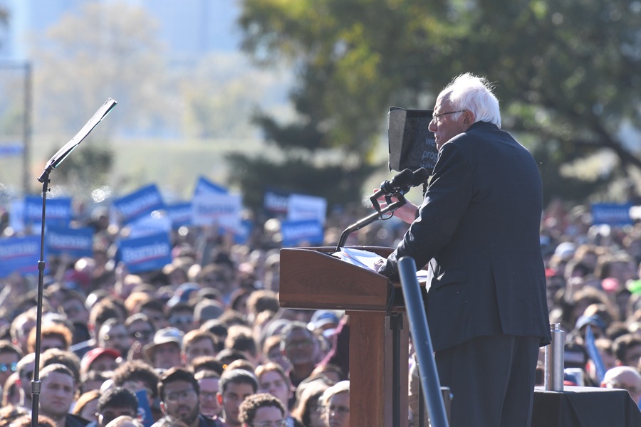 Crowd gathered at a political rally during an election cycle, illustrating civic engagement and voter participation