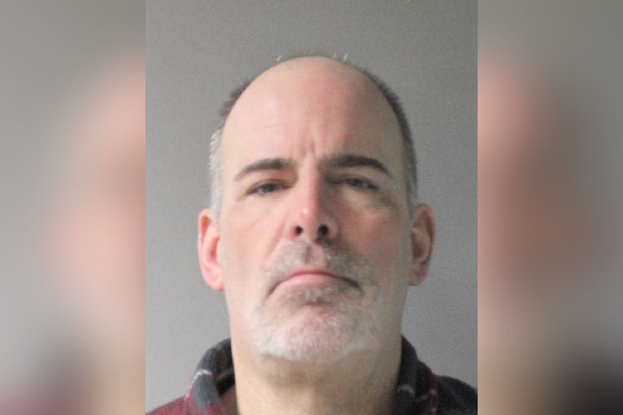 Christopher Jennings, 53, of Levittown, is shown in a booking photograph following his arrest by Nassau County police. Authorities said Jennings was taken into custody after an alleged robbery at a Walmart store in East Meadow. Police reported that he later resisted arrest but that no injuries were reported during the incident.