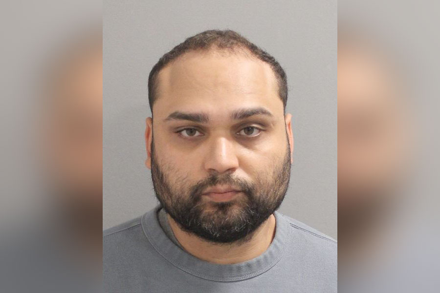 Booking photo of Richard Lopez, a Westbury man charged with using counterfeit currency at Nassau County retail stores.