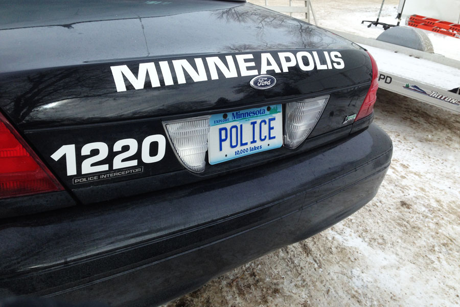 Minneapolis Police Department vehicle parked at a secured scene following a fatal ICE-related shooting in Minneapolis.