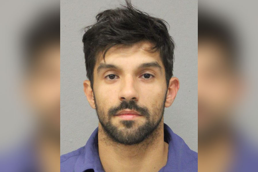 Booking photo of Anastassios Poukamisas, a Massapequa man charged with grand larceny in a $108,000 credit card fraud case in Nassau County.