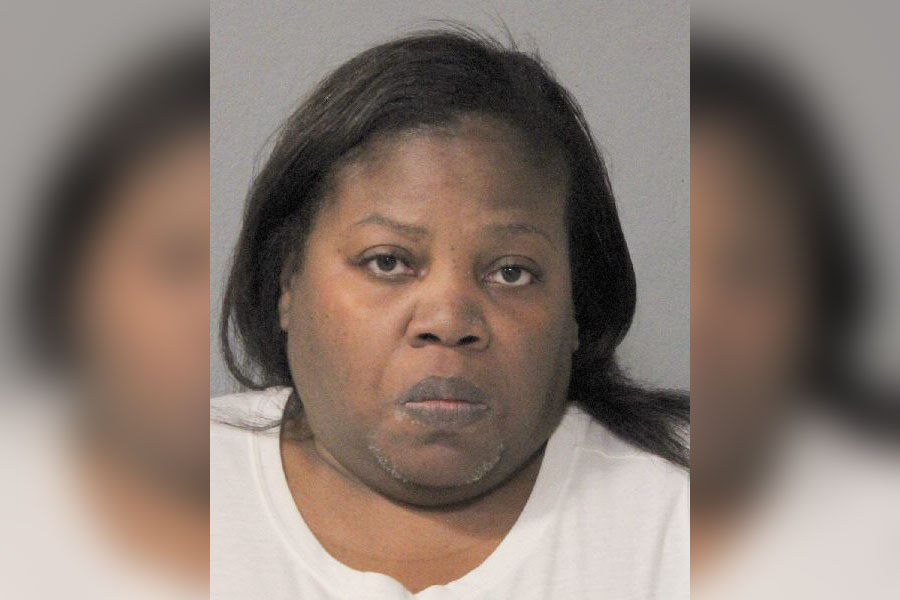 Booking photograph of Tavia Thomas, 47, of Hempstead