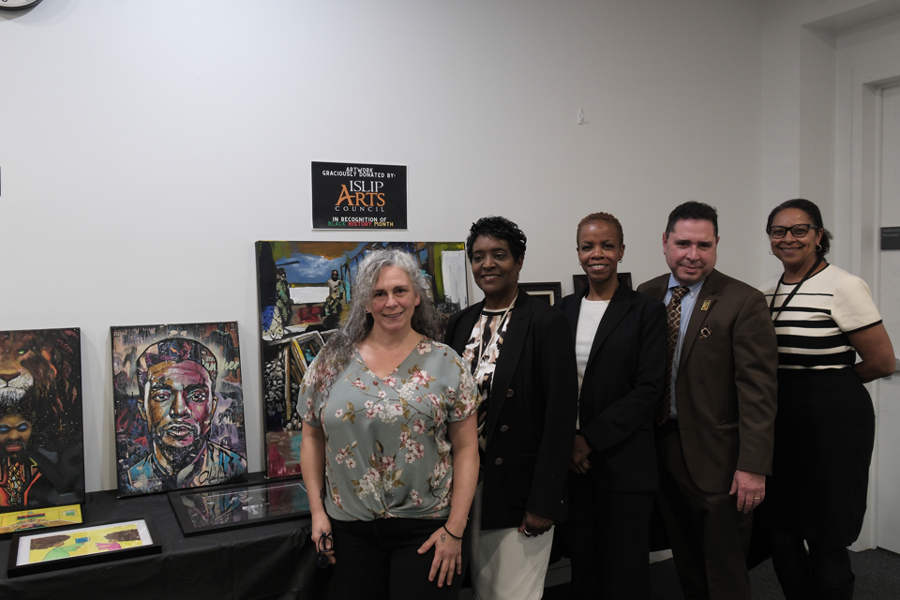 BHM Committee members pose with lecturer R. Carmenaty and President of Islip Arts Council Linda Weingarten