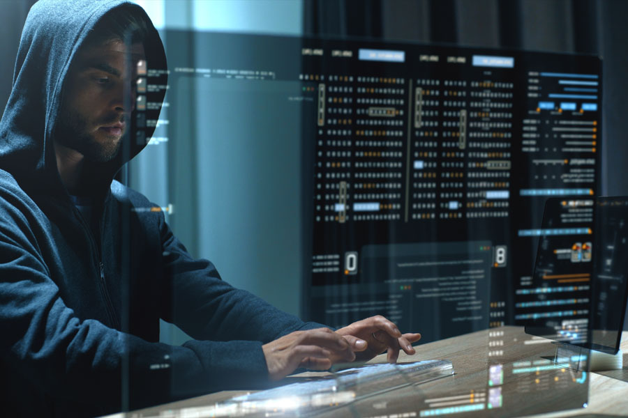 A cybercriminal uses automated tools to scan the internet for vulnerable systems, a tactic increasingly aimed at small and mid-sized businesses.