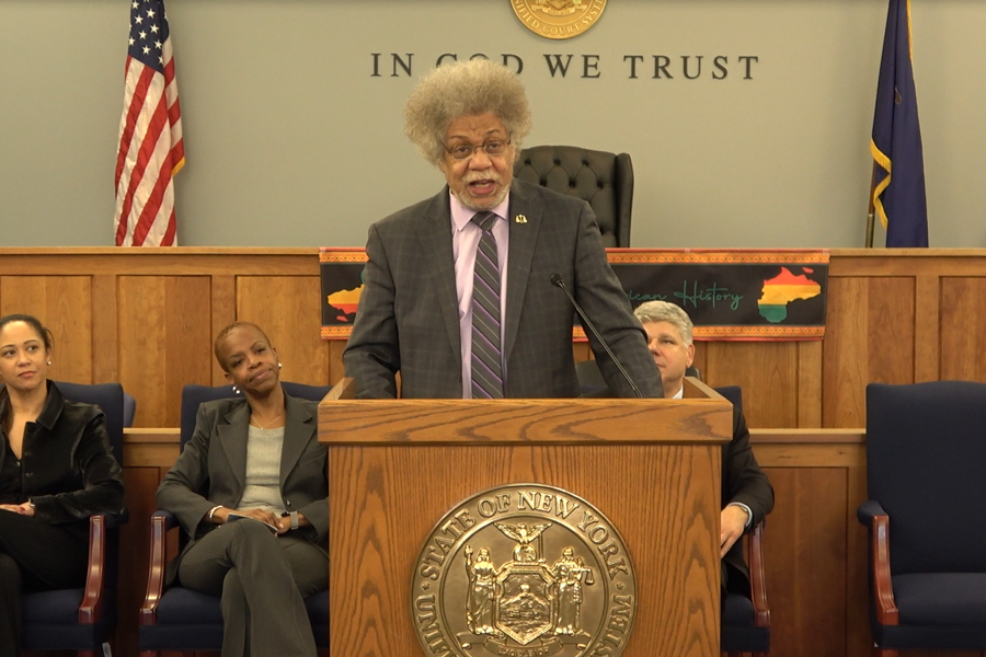 Associate Justice Paul Wooten delivers the keynote address during the Suffolk County Courts’ 2026 Black History Month Grand Celebration as Diane Clark, Hon. Cheryl Joseph, and Administrative Judge Andrew A. Crecca look on in the Ceremonial Courtroom in Central Islip.
