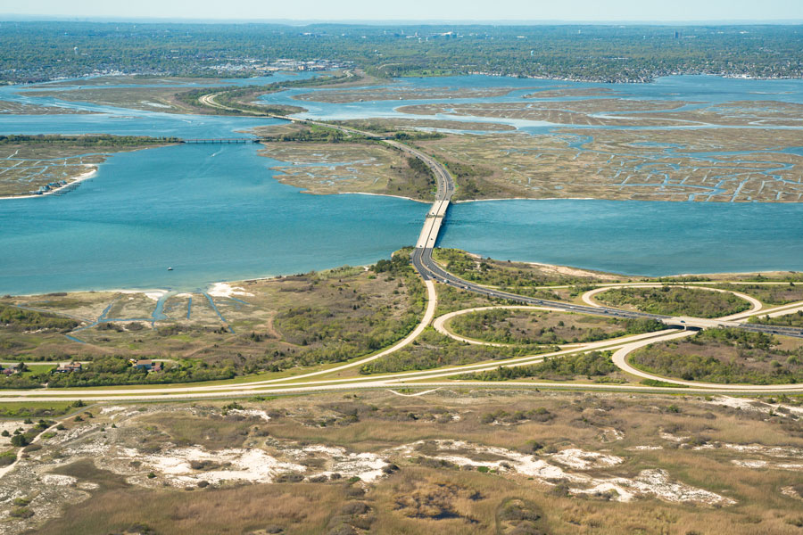 Aerial view over Nassau County on Long Island New York with parkway in view