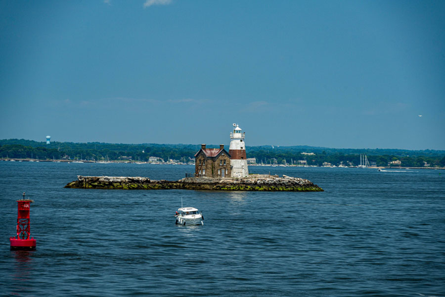 Execution Rocks Lighthouse stands in Long Island Sound off the coast of Sands Point on the North Shore. 