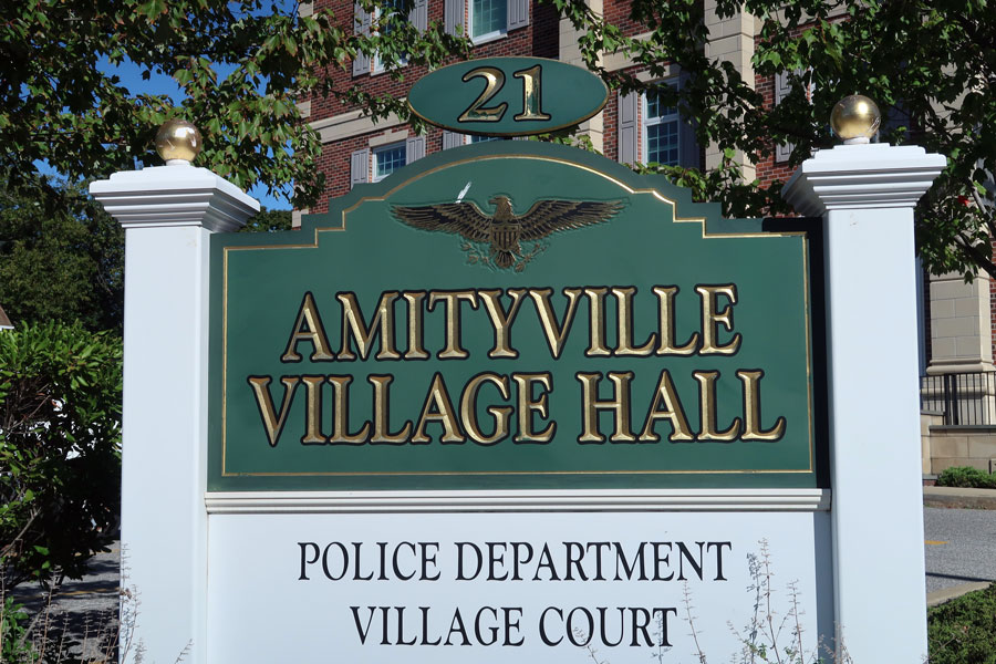 Amityville Village Hall in Suffolk County, New York, home to local government offices including the police department and village court. Located just south of North Amityville, the building serves as the administrative center for the surrounding South Shore community.