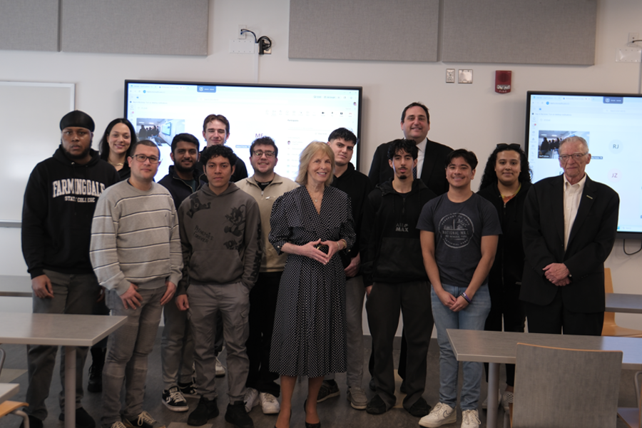 J. Tinari in center w Lecturer Lupinacci in back, Assoc. Prof. John Masserwick at right. 