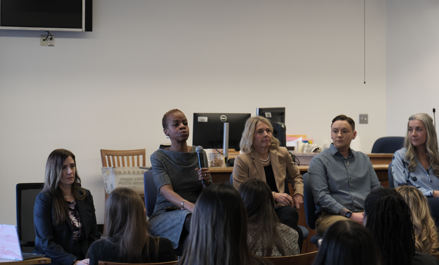 Panelists share their career journeys and experiences in public service during the Women in the Law discussion. 