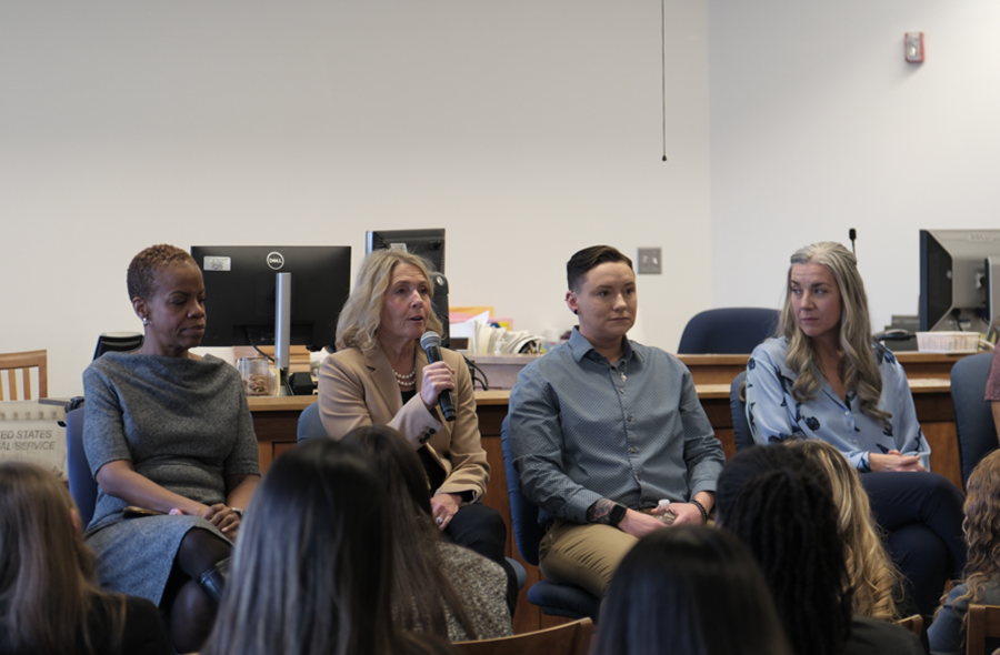 Hon. Mary Kate Mullen engages directly with students, answering questions during the interactive panel discussion. 