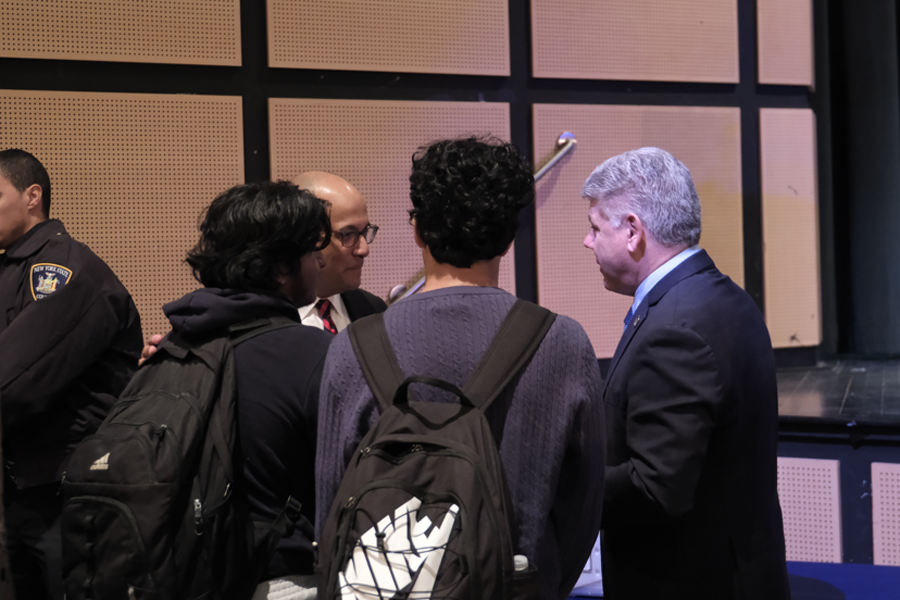 Justices LaSalle and Crecca talk with students after the court’s presentation. Photo credit: Julia Carpenter, NY Unified Court System.