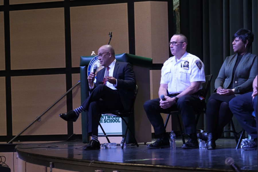 Justice LaSalle shares anecdotes from his professional journey as Lieutenant Martinez and Associate Court Clerk Douglas look on. Photo credit: Julia Carpenter, NY Unified Court System