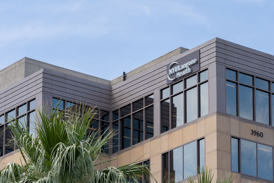 Exterior view of an NYU Langone Health medical facility on Long Island, reflecting the system’s expanding network of modern healthcare centers across the region.