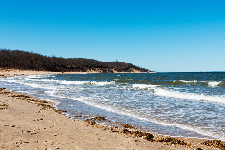 Sunken Meadow State Park along Long Island’s North Shore, looking west toward the coastal bluffs on a clear afternoon. The shoreline and natural landscape reflect the same scenic character found in nearby communities such as Miller Place.