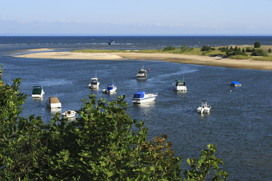 View of a mooring station on the Nissequogue River as seen from Nissequogue state park on Long Island, New York.