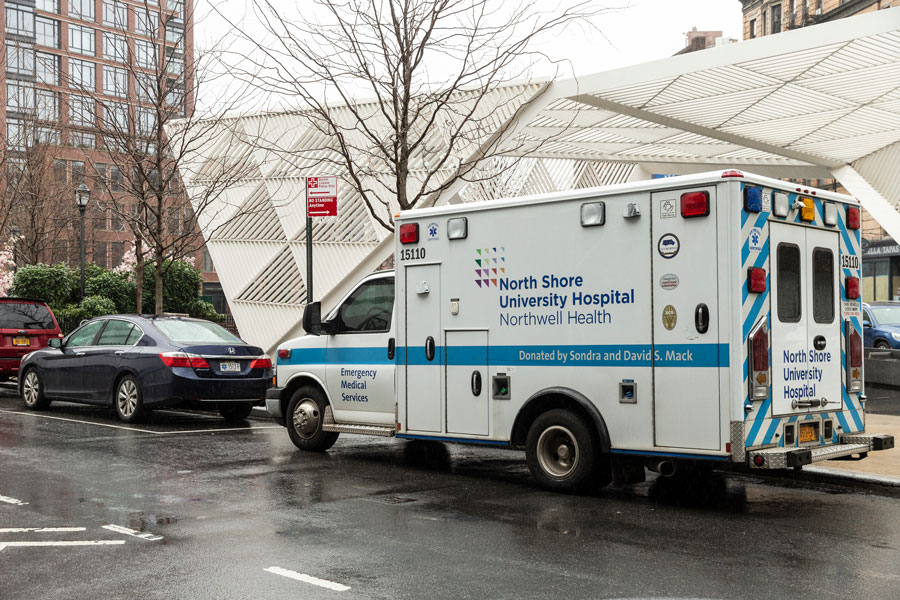 Ambulance operated by Northwell Health outside a North Shore University Hospital facility, reflecting the system’s emergency medical services and patient care operations in the region.