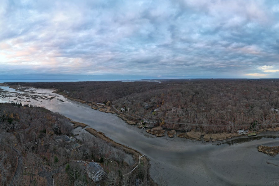 A panoramic view of the Nissequogue River on Long Island’s North Shore during low tide in late autumn, revealing winding channels, exposed marshland, and the quiet natural landscape that defines this protected river corridor. File photo: licensed.
