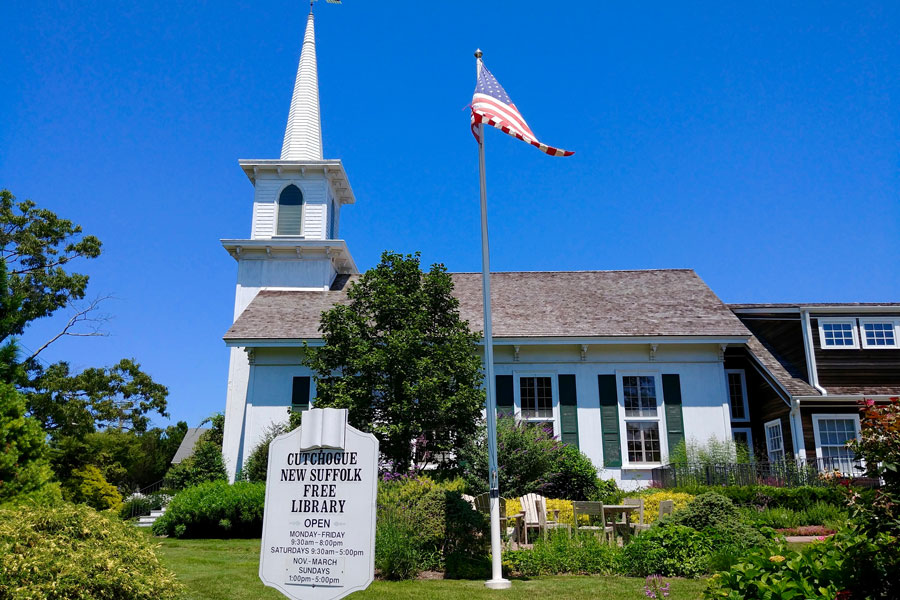 The Cutchogue New Suffolk Free Library stands as a longtime community landmark on Long Island’s North Fork, reflecting the historic small-town character and quiet charm of Cutchogue. File photo: licensed.