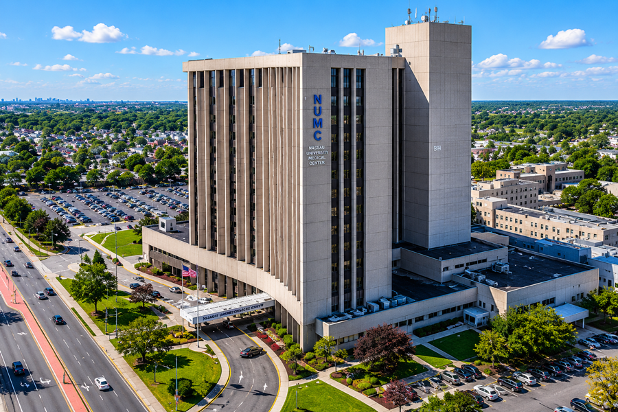 Nassau University Medical Center (NUMC) rises above East Meadow, serving as Nassau County's public teaching hospital and regional healthcare hub. Located along Hempstead Turnpike in the Town of Hempstead, the distinctive medical complex provides emergency care, specialized treatment, medical education, and community health services to residents throughout Long Island.