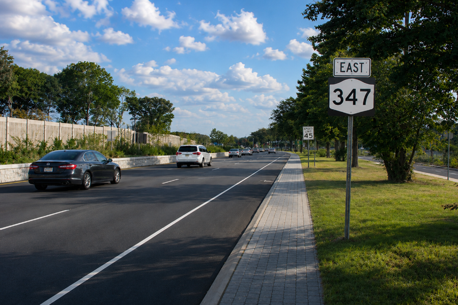 Eastbound traffic travels along NY-347, also known as Nesconset Highway, one of the primary commercial and transportation corridors in Suffolk County connecting communities including Hauppauge, Smithtown, Stony Brook, Lake Grove, and Port Jefferson Station on Long Island, New York.