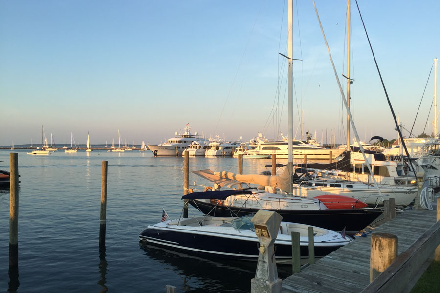 Boats and luxury yachts docked along the waterfront in North Haven near Sag Harbor, reflecting the boating culture and scenic harbor atmosphere that define this quiet Hamptons community on Long Island’s South Fork.