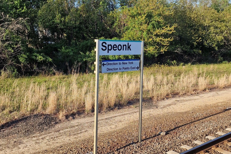 The Speonk station sign marks one of the easternmost major stops on the Long Island Rail Road’s Montauk Branch, serving as an important gateway between New York City and Long Island’s East End communities.